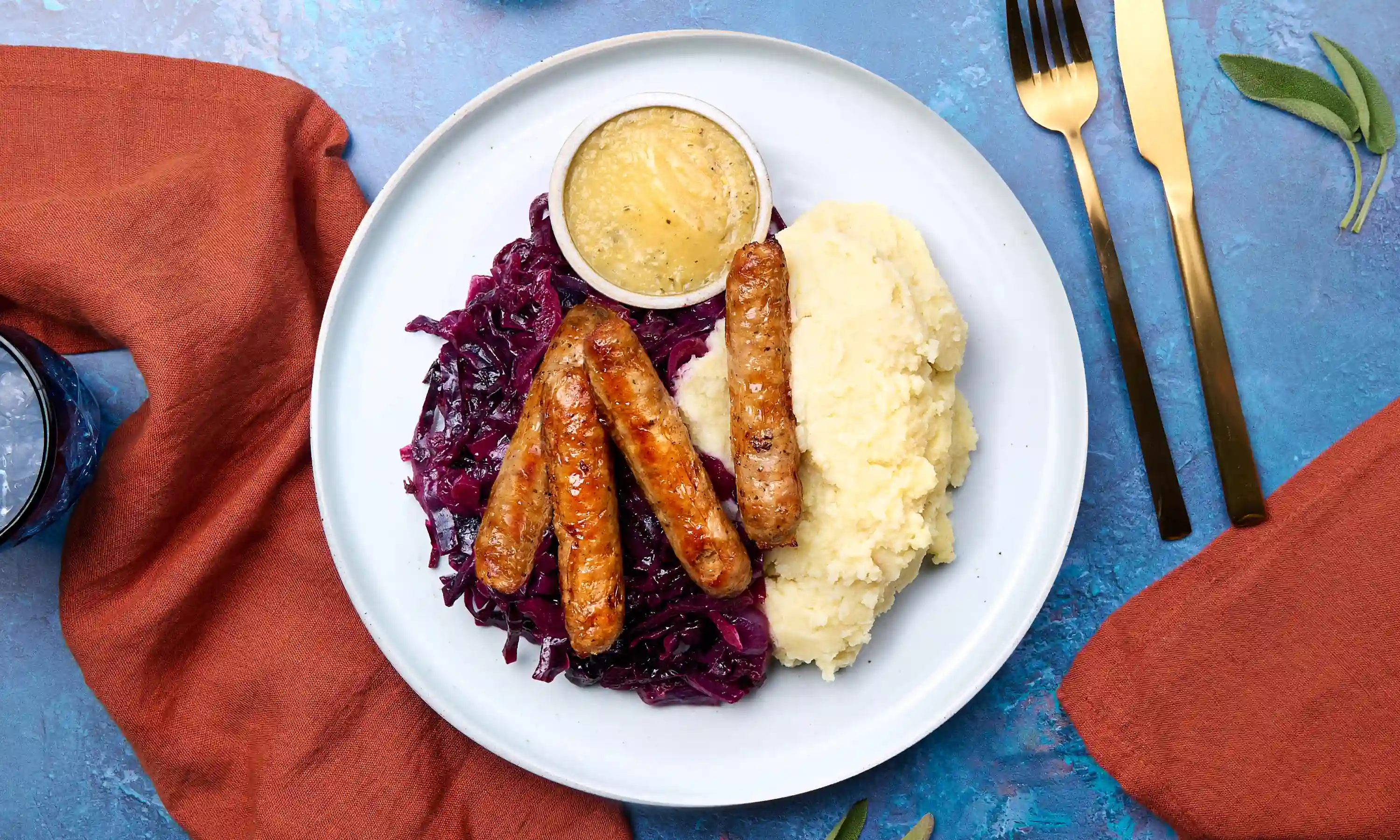 Honey Mustard Chipolatas with Garlic Mash & Red Cabbage